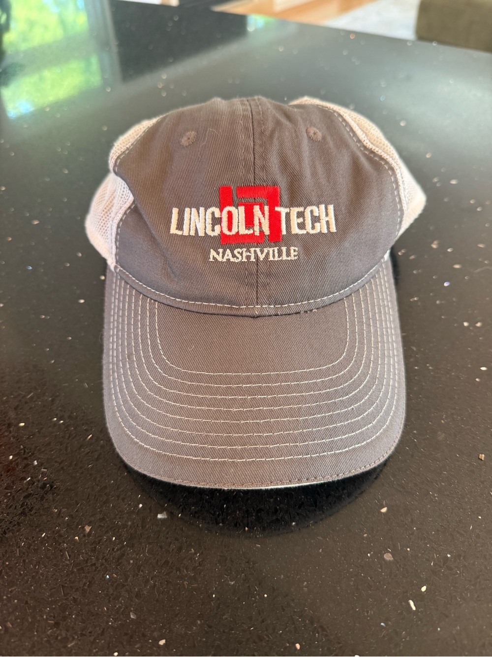 Nashville Lincoln Tech Gray and White Trucker Hat